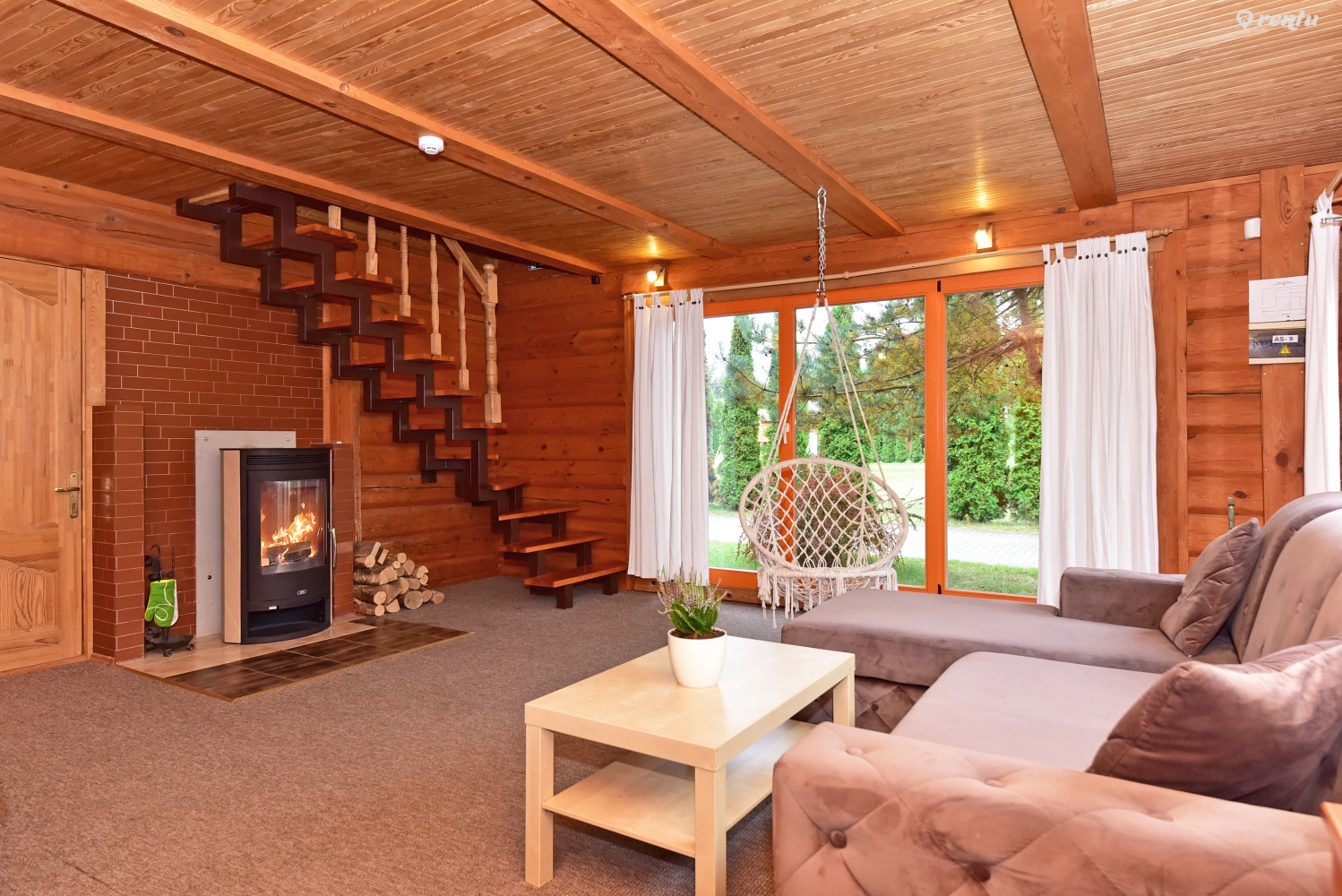 Wooden cottage house with fireplace