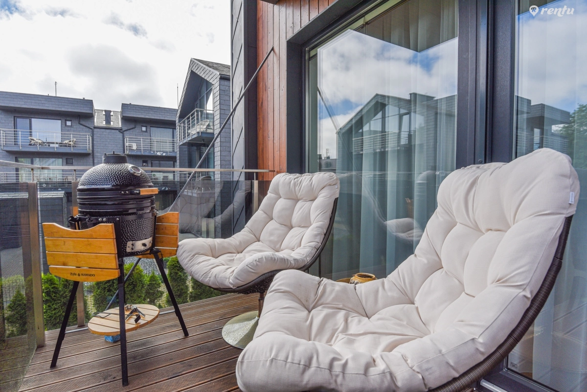 Gintarinė KOPA apartment with balcony and pond view