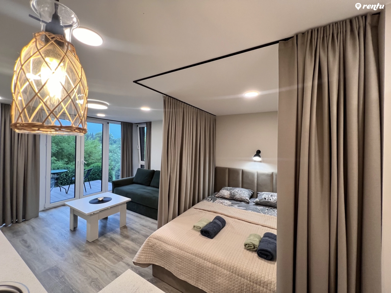 Cherry studio apartment with large balcony